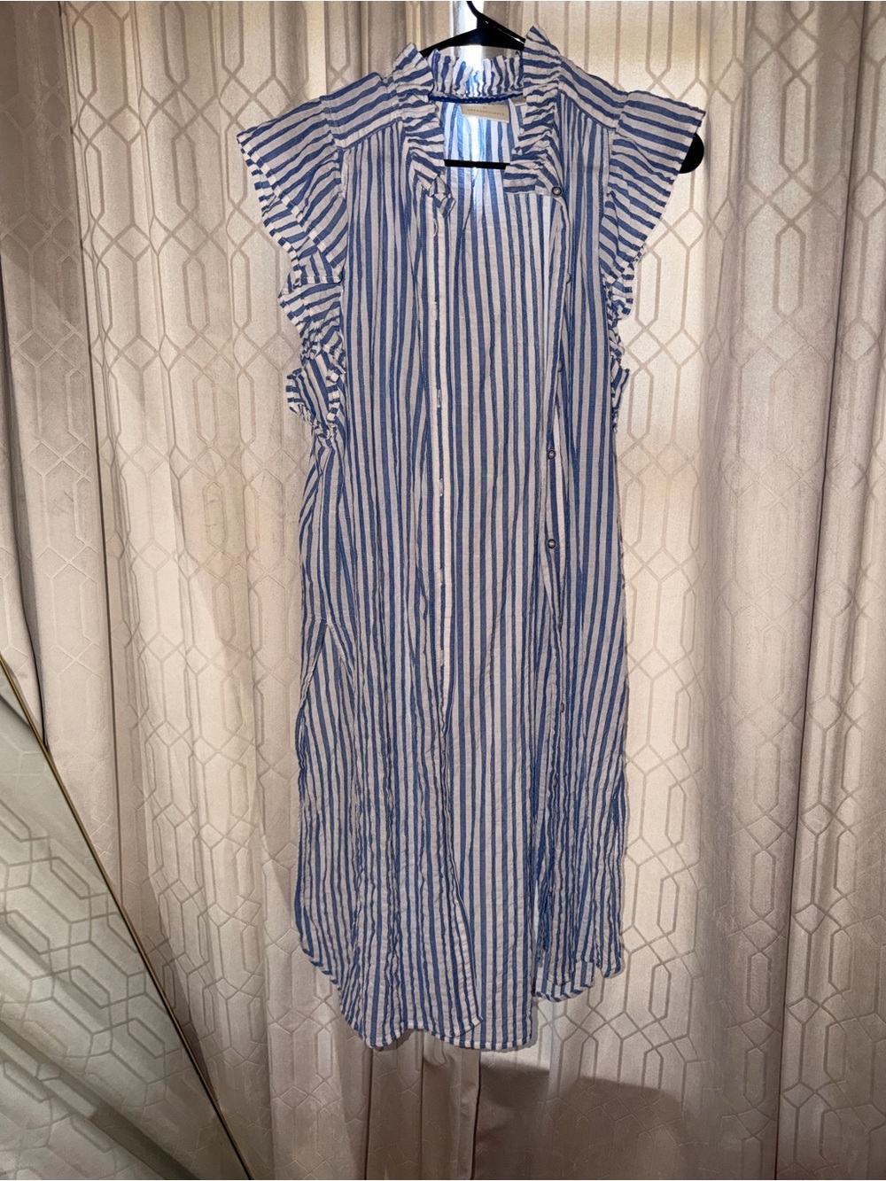 Blue and White Striped Long Sleeveless Shirt